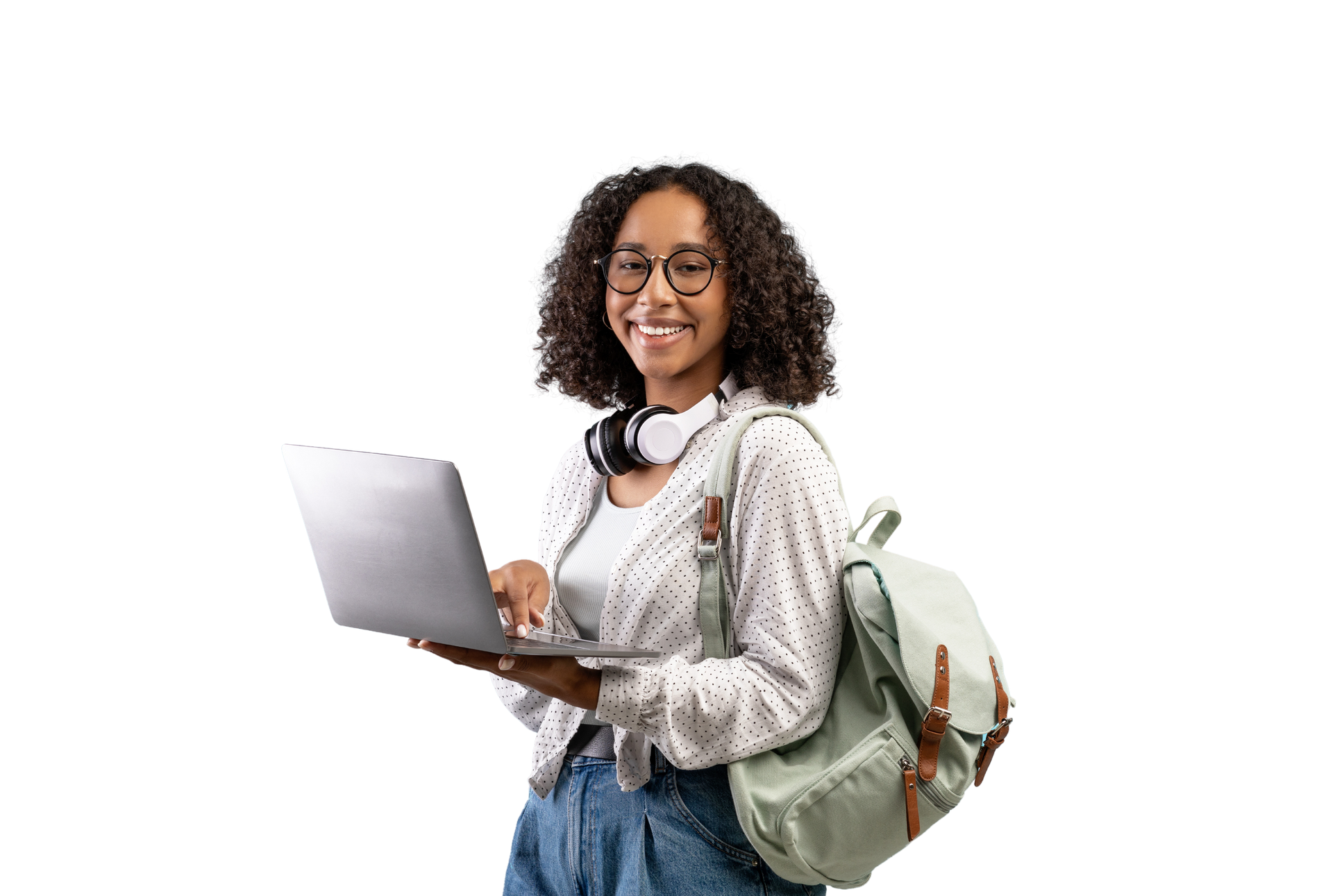 Cheerful young black woman with backpack and headphones holding laptop pc over blue studio background