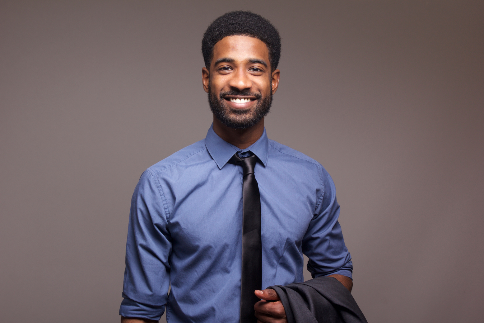 Portrait of a Businessman on Grey Background