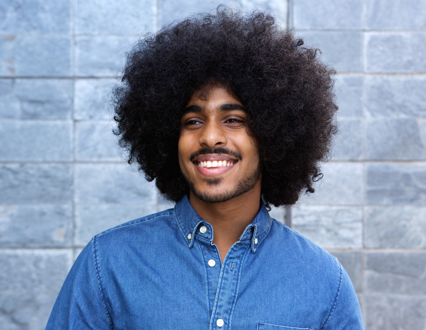 Cool Young Black Guy Smiling with Afro